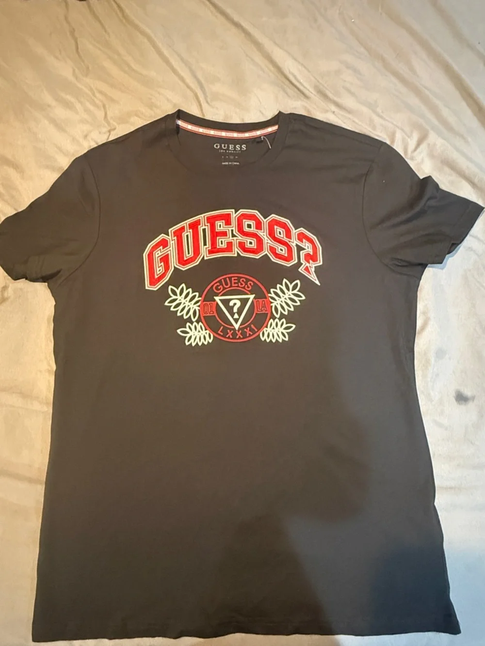 GUESS Black Short-Sleeve Tee with Red Logo Crest - Picture 1 of 5